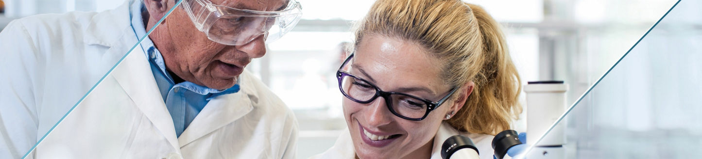 Lab technicians reviewing a sample