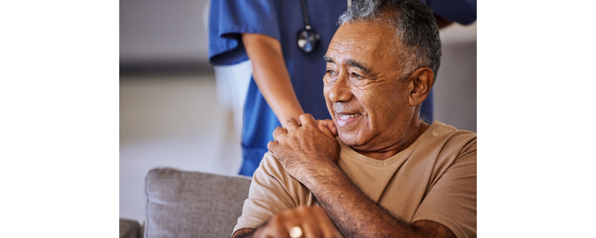 Smiling patient supported by a healthcare professional symbolizing trust and innovation in modern diagnostics care