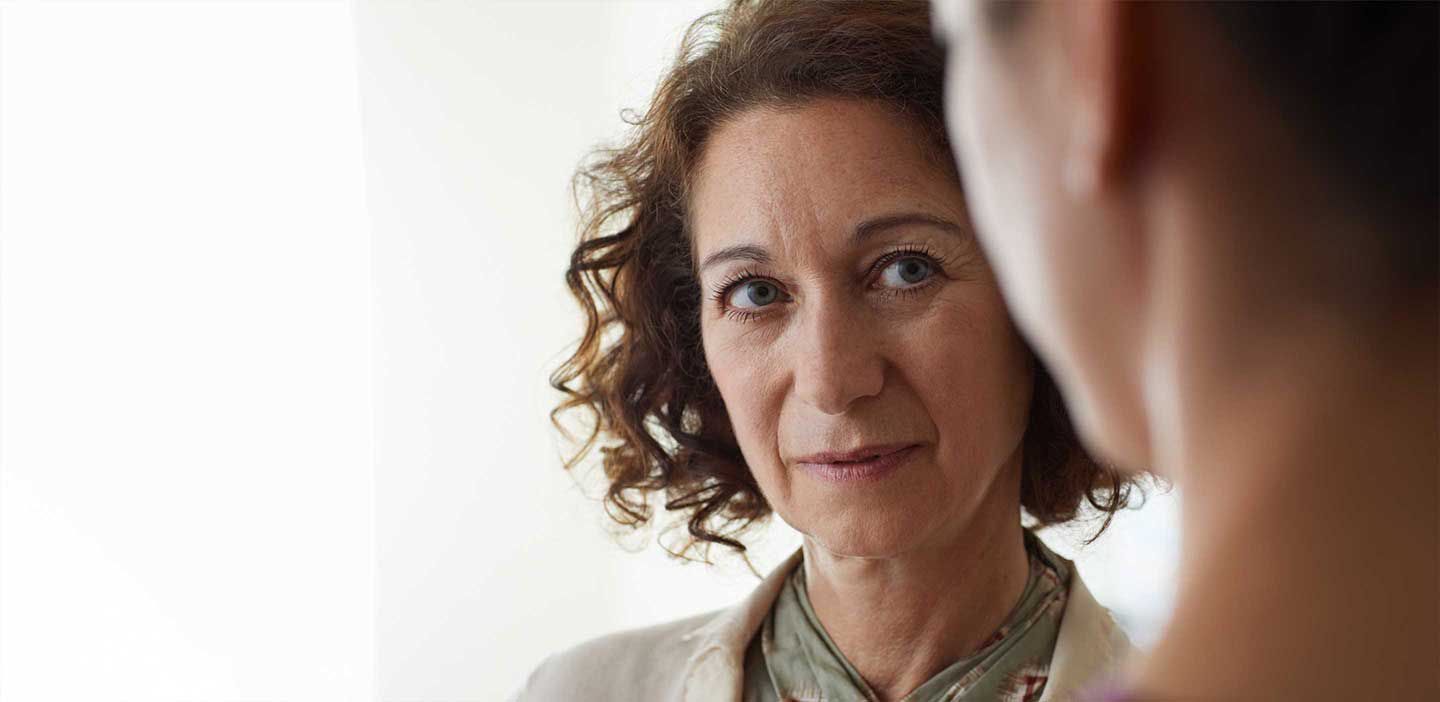 Patient talking to nurse