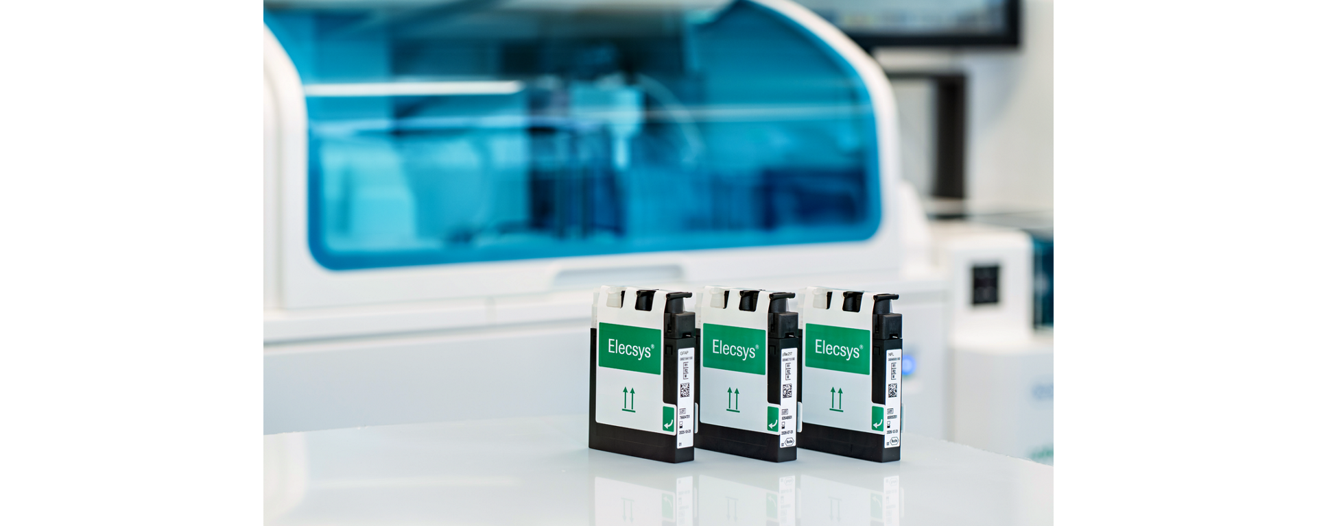 Three Elecsys Research Use Only RUO kits for GFAP NfL and pT217 in front of a cobas e801 analytical system