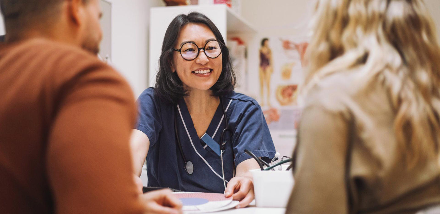 Doctor discussing Elecsys AMH (Anti-Müllerian Hormone) test results with patients