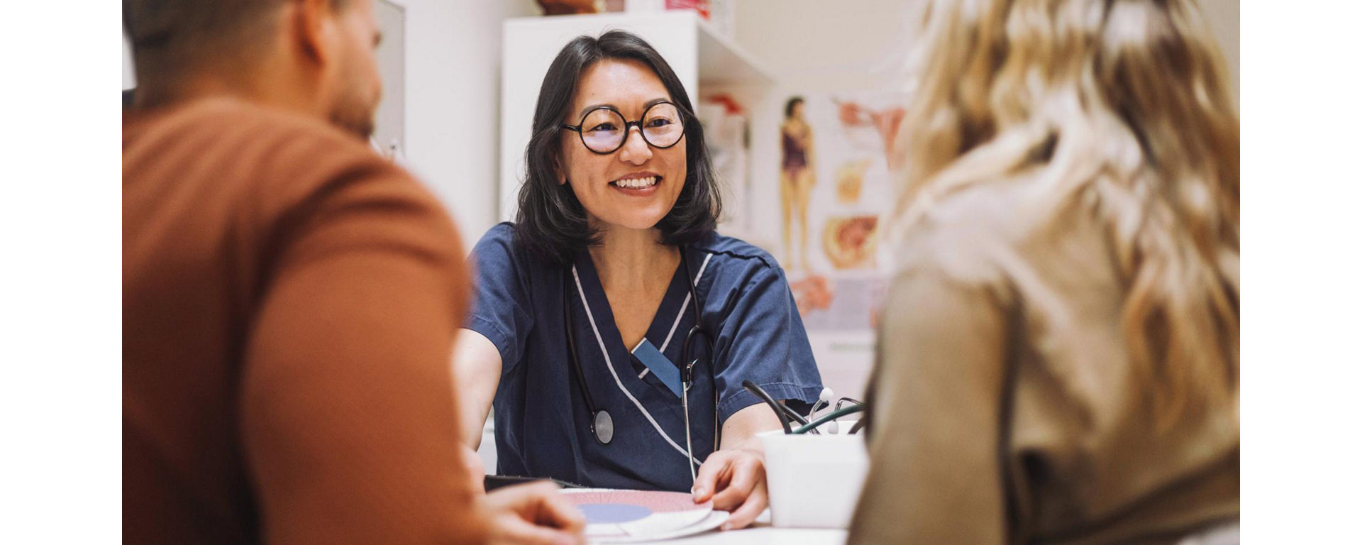 Doctor discussing Elecsys AMH (Anti-Müllerian Hormone) test results with patients