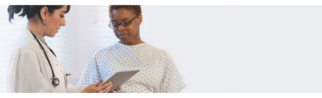 pregnant patient talking to her doctor