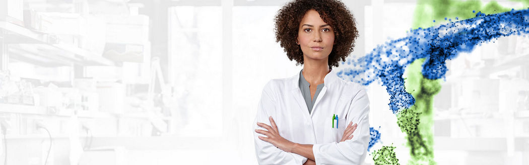 female scientist looking into the camera with a helix in the background