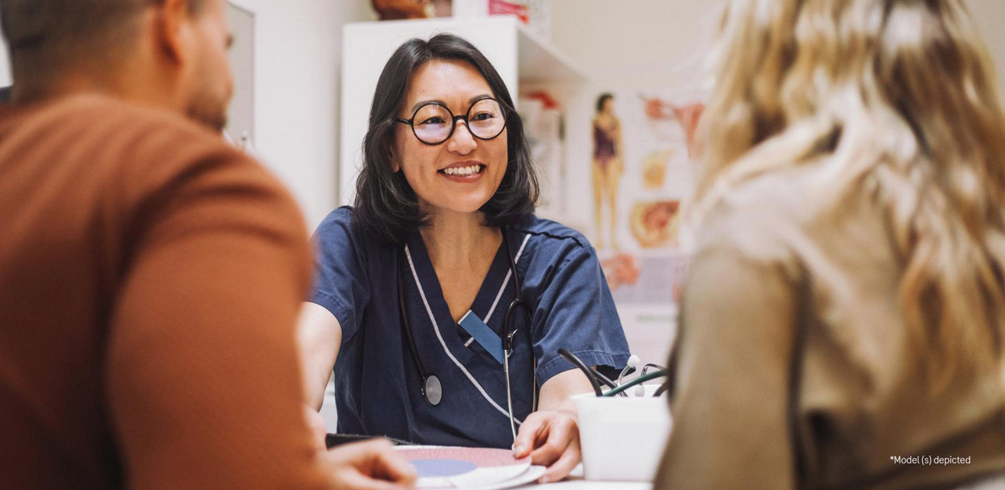 doctor talking to patients