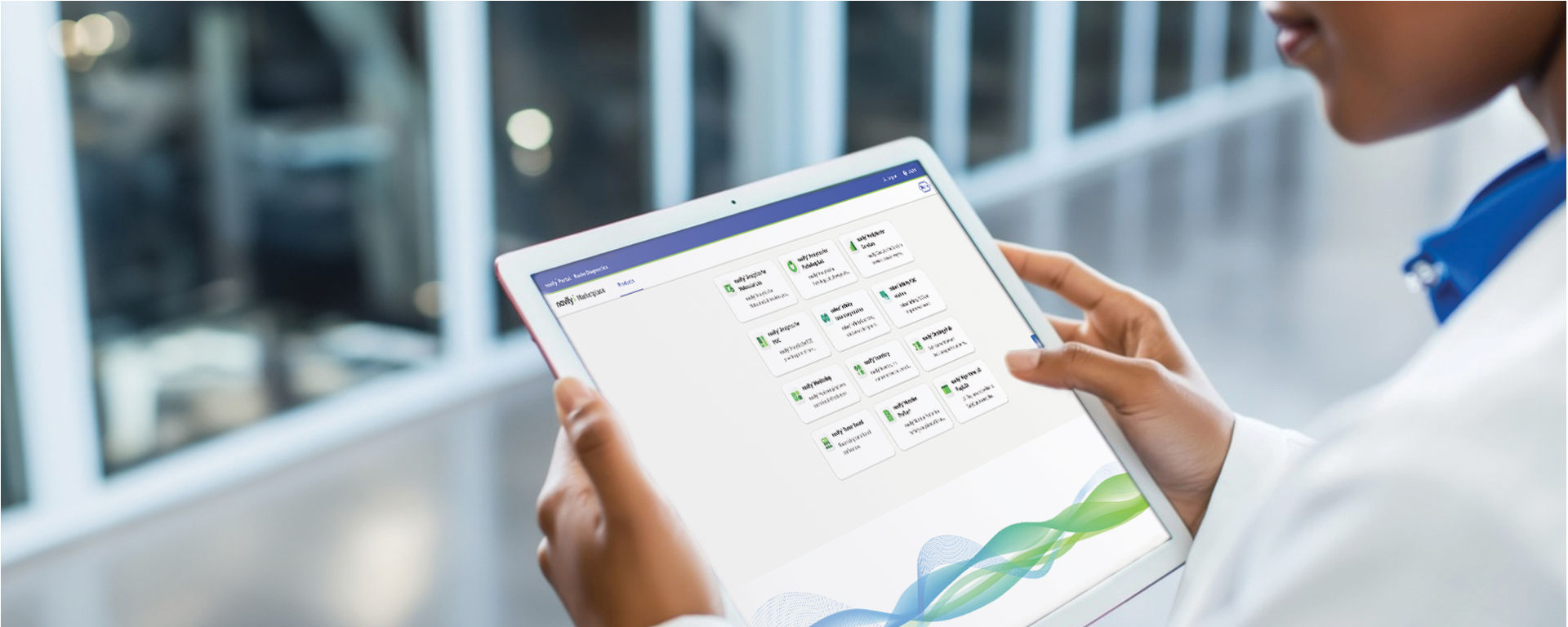 Lab technician holds an iPad to access navify marketplace for an overview of digital solutions from Roche